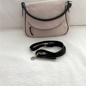 Chic Cream and Black Crossbody Bag
By Kate Spade